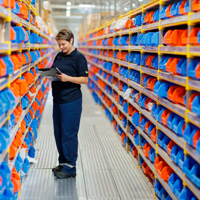 How can the right footwear help prevent slips, trips, and falls?